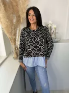 Lenge fazonú, rugalmas, puha, alul ingbetétes, kötött felső. (S-XL méretre ajánljuk.)