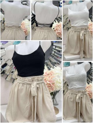   Rugalmas, pamut anyagú, belevarrt szivacsbetétes, pántos top. S-L méretre ajánljuk.